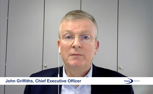 Man talking to a camera with a ear piece